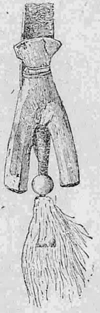 Деревянная фигура, представляющая защитника новорожденного